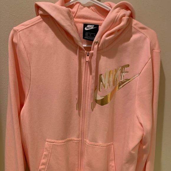 pink and gold nike sweatshirt